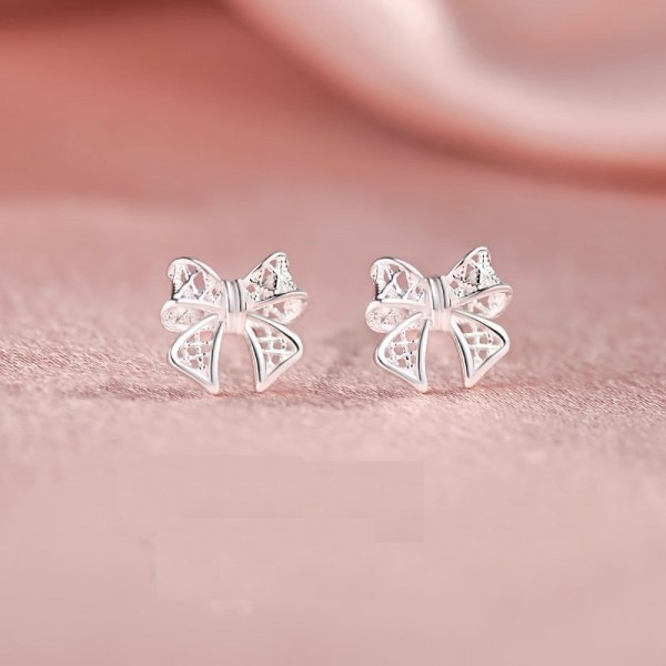 S999 Sterling Silver Hollow-out Bow Earrings